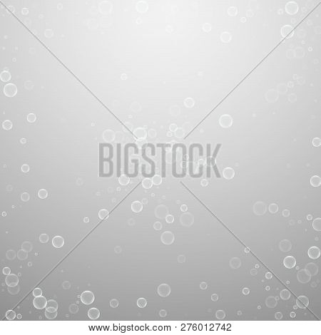 Soap Bubbles Abstract Background. Blowing Bubbles On Light Grey Background. Bizarre Soapy Foam Overl