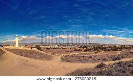 Ancient Ruins Of Kourion City Near Pathos And Limassol, Cyprus. Lighthouse Under The Blue Sky. Trave