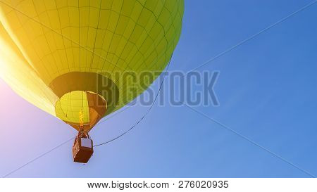 Hot Air Balloon Flight View From Below In The Blue Sky