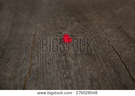 Small Wooden Red Heart On An Old Dry Wooden Board For Valentines Day Close Up