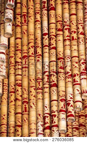 Painted Bamboo Poles In Sarawak Bornero South East Asia