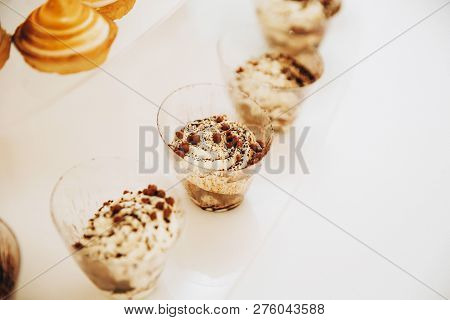 Assortment Of Pieces Of Cake On Messy Table, Copy Space. Several Slices Of Delicious Desserts, Resta