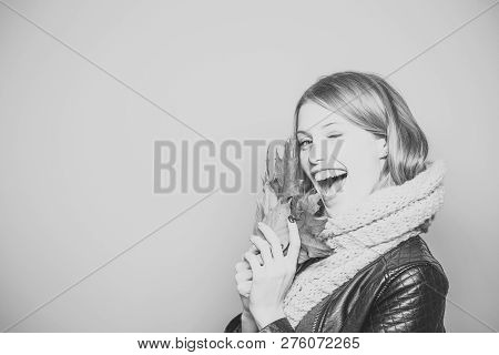 Season And Autumn Holiday. Beauty And Fashion. Happy Model With Stylish Hair In Scarf. Woman With Au
