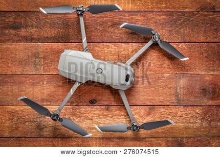 Fort Collins, CO, USA - December 27, 2018: DJI Mavic 2 pro against rustic wood - an andvanced prosumer folding drone.