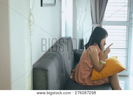 Wife Reconcile Talking Mobilephone To Her Husband At The Living Room,negative Attitude Emotions