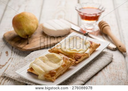 puff pastry with pears honey and tomino cheese