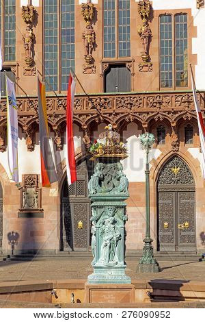 Old Fountain At Roemer With An Provisional Artifical Stoch Nest And Allegory Figures From The 19th C