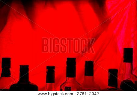 Alcohol Bottle On Red Backround