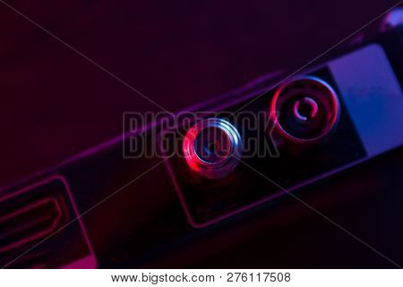 Close Up Of Some Electronic Stuff In Neon Light