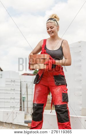 Woman Working With Bricks