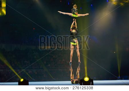 Moscow, Russia - November 16-17, 2018: Acrobats Daria Tikhomirova, Inna Yumashev And Sophia Polishch