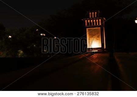 A Lantern Illuminating The Darkness Of The Night