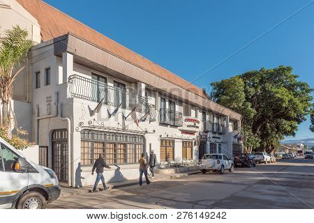 Clanwilliam, South Africa, August 28, 2018: A Street Scene, With An Hotel, Vehicles And People, In C