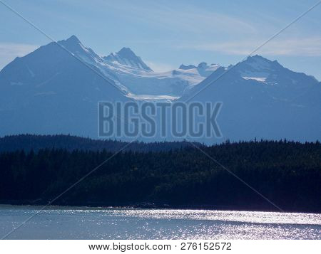 Alaskan Mountains Tower Behind Tongass National Forest