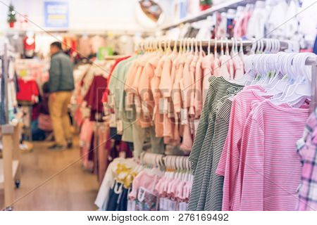 Selective Focus Image Of Customer Shopping At Baby Clothing Shop In America