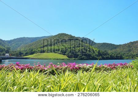 Beautiful Landscape Mountain River Garden And Sky