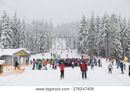 Bukovel, Ukraine - December 25:  The Skiers Waiting For A Lift In Bukovel Ski Resort. It Is The Larg