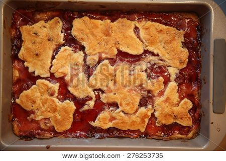 Cherry Cobbler. Home made Cherry Cobbler in a baking pan.