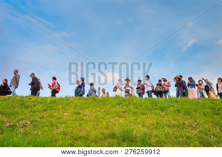 Iwate , Japan - April 22 2018: Unidentified People Wait For Ferry Boat Crossing The Kitakami River T