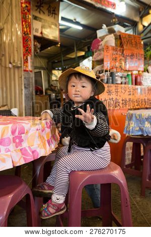 Taiwan, Cingjing - : An Unidentified Taiwanese Indigenous Young Girl Curiously Say Hello To The Came