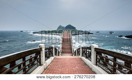 This Is A Popular Tourist Destination In Sanxiantai, Taiwan. It Is A Bridge That Crosses The Ocean T