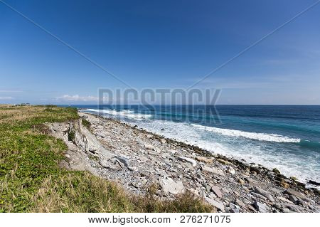 Beautiful Clear Blue Sky And Ocean. This Simple Image Has Peaceful And Serene Feel. This Is Suitable