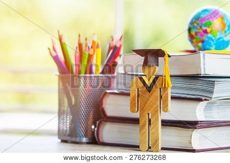 Europe Education Knowledge Learning Study Abroad International Ideas. Student Sign Wood With Graduat