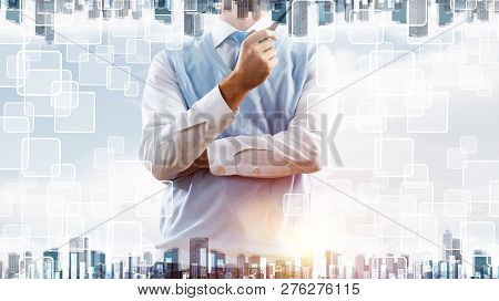 Double Exposure Of Confident And Young Businessman In Smart-casual Wear Smoking Pipe And Modern City