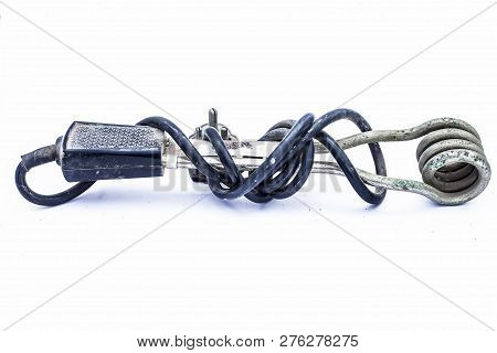Close Up Of Black Handled Immersion Rod Or Immersion Water Heater Isolated On White.