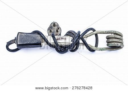 Close Up Of Black Handled Immersion Rod Or Immersion Water Heater Isolated On White.