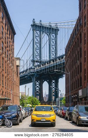 New York, Usa - May 26, 2018: Yellow Cab On A Street In Dumbo Of New York City. It Is A Major Attrac