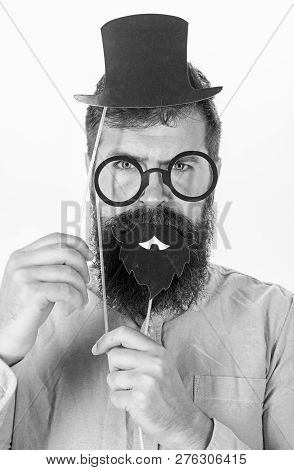 Man In Pink Shirt Holding Party Acsessories. Hipster With Trendy Beard Celebrating Birthday, Party C