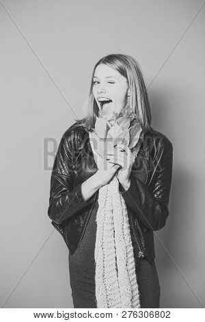 Season And Autumn Holiday. Girl With Orange Leaves On Orange Background. Woman With Autumn Leaves In