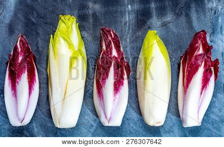 Food Background, Flat Lay Concept With Fresh Green Belgian Endive Or Chicory And Red Radicchio Veget