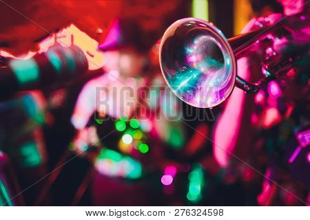 Close Up Of Saxophone Player Hands Playing Alto Sax Musical Instrument Over Piano Background , Close