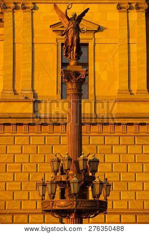 Historic Street Lamp In Front Of Rudolfinum, Prague, Czech Republic. The Rudolfinum Is A Building In