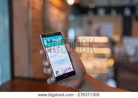 Chiang Mai, Thailand - June 09,2018: Man Holding Huawei With Google Maps On The Screen.google Maps I