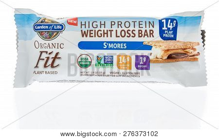 Winneconne, Wi - 30 December 2018: A Package  Of Garden Of Life High Protein Weight Loss Bar On An I