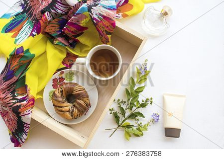 Yellow Scarf ,sunscreen Spf50 ,perfume ,ginger Tea ,bread Of Lifestyle Woman Relax On Background Whi