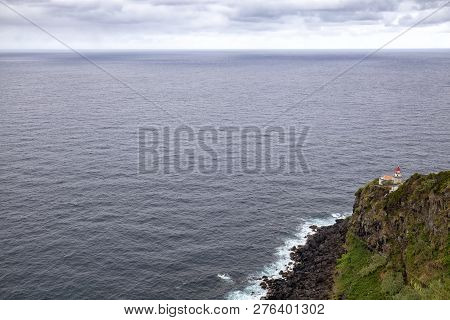 Beautiful Lighthouse In A Misty Summer Day In The Azores