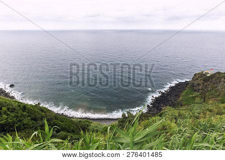 The Faro Do Arnel Lighthouse Overlooking The Atlantic Ocean On The Island Of Sao Miguel In The Azore