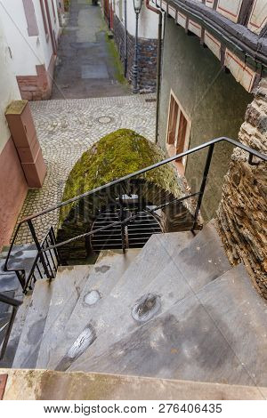 Steep Stone Stairs Leading To The Old Well In The Small German Town Of Bashar
