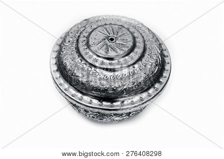 Close Up Of White Or Silver Colored Shiny Container Isolated On White.