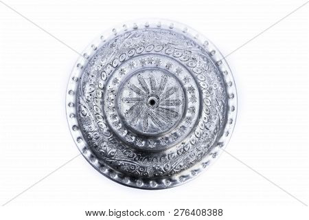 Close Up Of White Or Silver Colored Shiny Container Isolated On White.