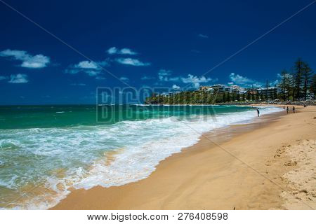 CALOUNDRA, AUS - DEC 28 2018: Hot sunny summer day at Moffat Beach, Calundra, Queensland, Australia