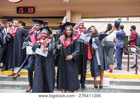 Grodno, Belarus - June, 2018: Happy Foreign African Medical Students In Square Academic Graduation C
