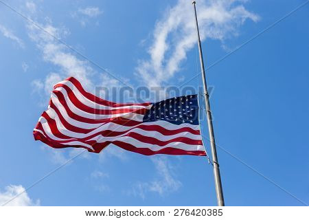 United States Flag Flying At A Half-staff