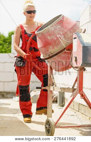 Strong Woman Working With Construction Site