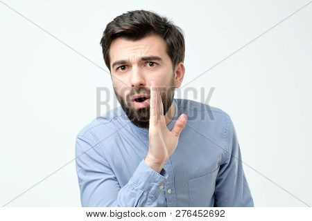 Man Whispering Gossip Isolated On A White Background