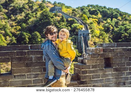 Happy Cheerful Joyful Tourists Dad And Son At Great Wall Of China Having Fun On Travel Smiling Laugh